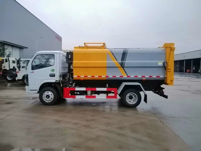 東風(fēng)牌5方6方側(cè)裝壓縮垃圾車(chē)